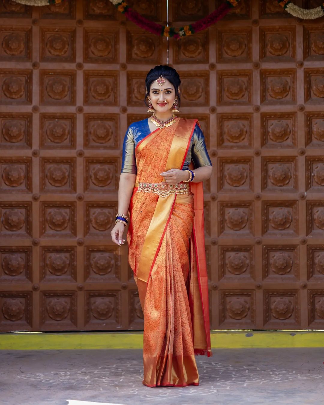 Telugu TV Actress Sridevi Vijaykumar Images in Orange Saree Blue Blouse 5